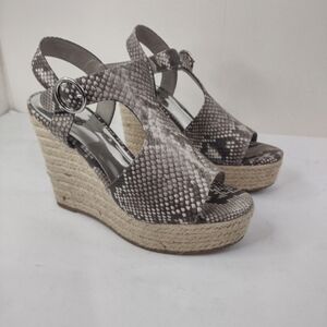 Carlos by Carlos Santana women's robe wedge sandals size (7M)